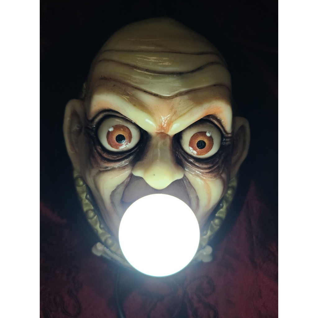 Zio Fester con lampadina Quadro tridimensionale