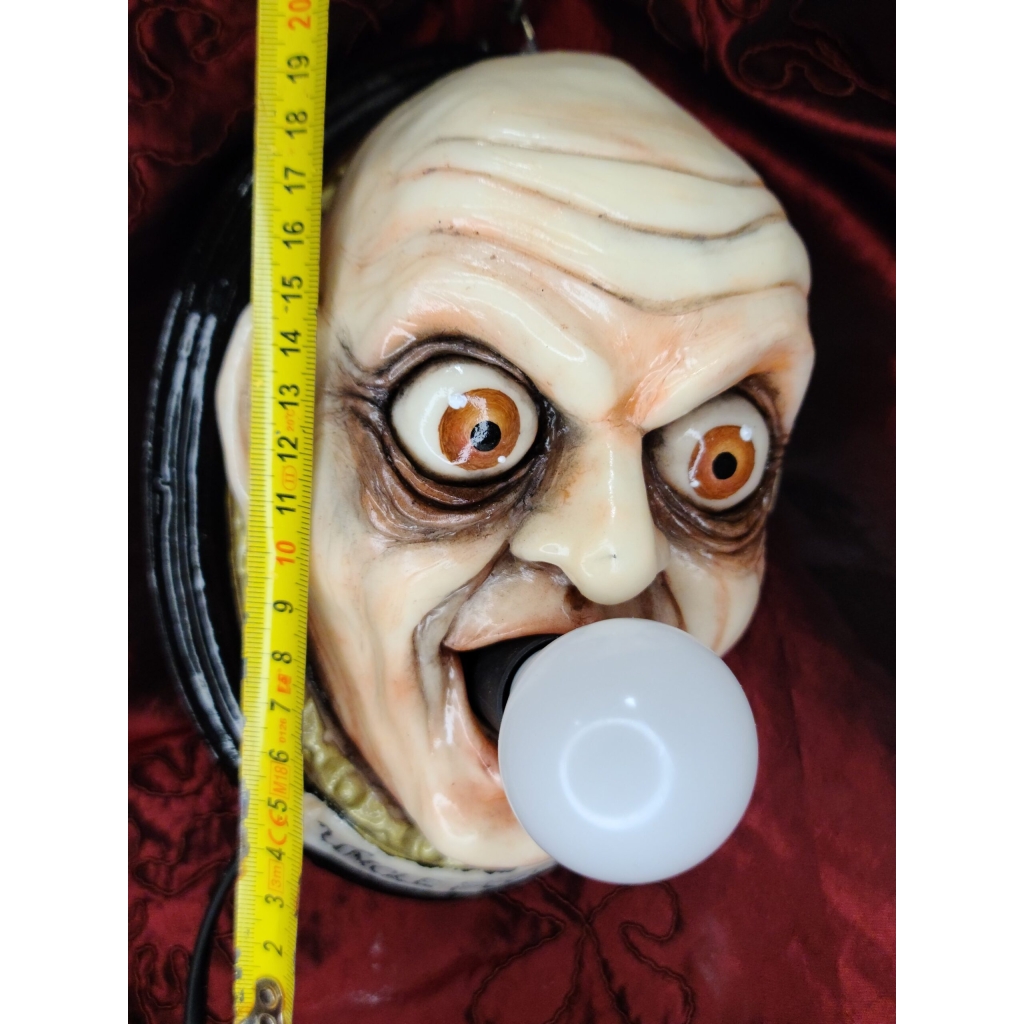 Zio Fester con lampadina Quadro tridimensionale