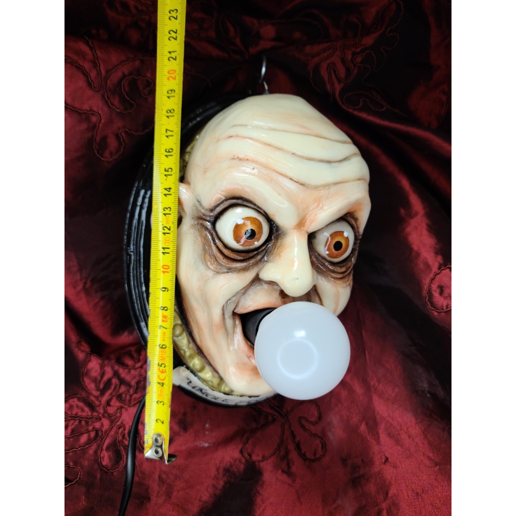 Zio Fester con lampadina Quadro tridimensionale