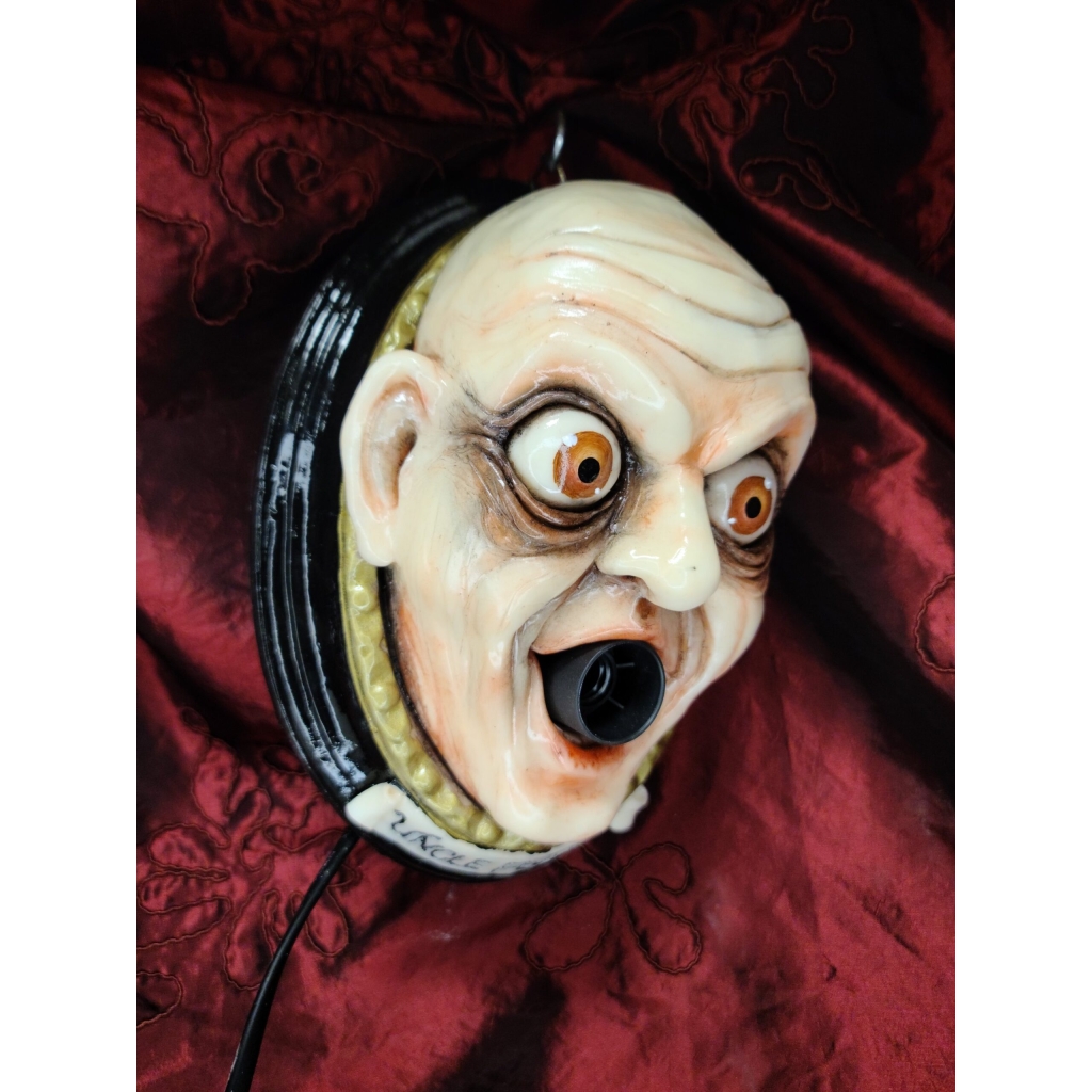 Zio Fester con lampadina Quadro tridimensionale