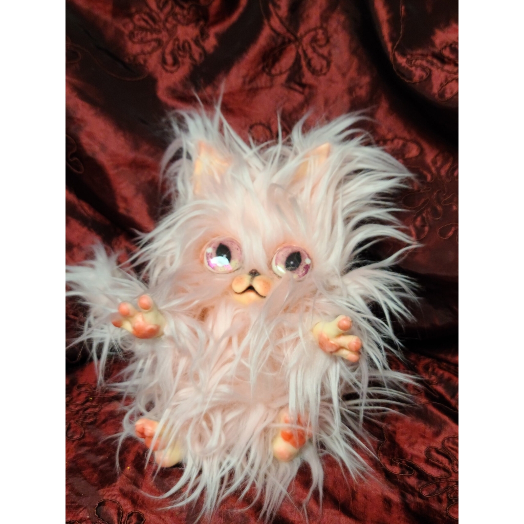 Miagowi, il frutto dell'unione di un gatto e un mogwai